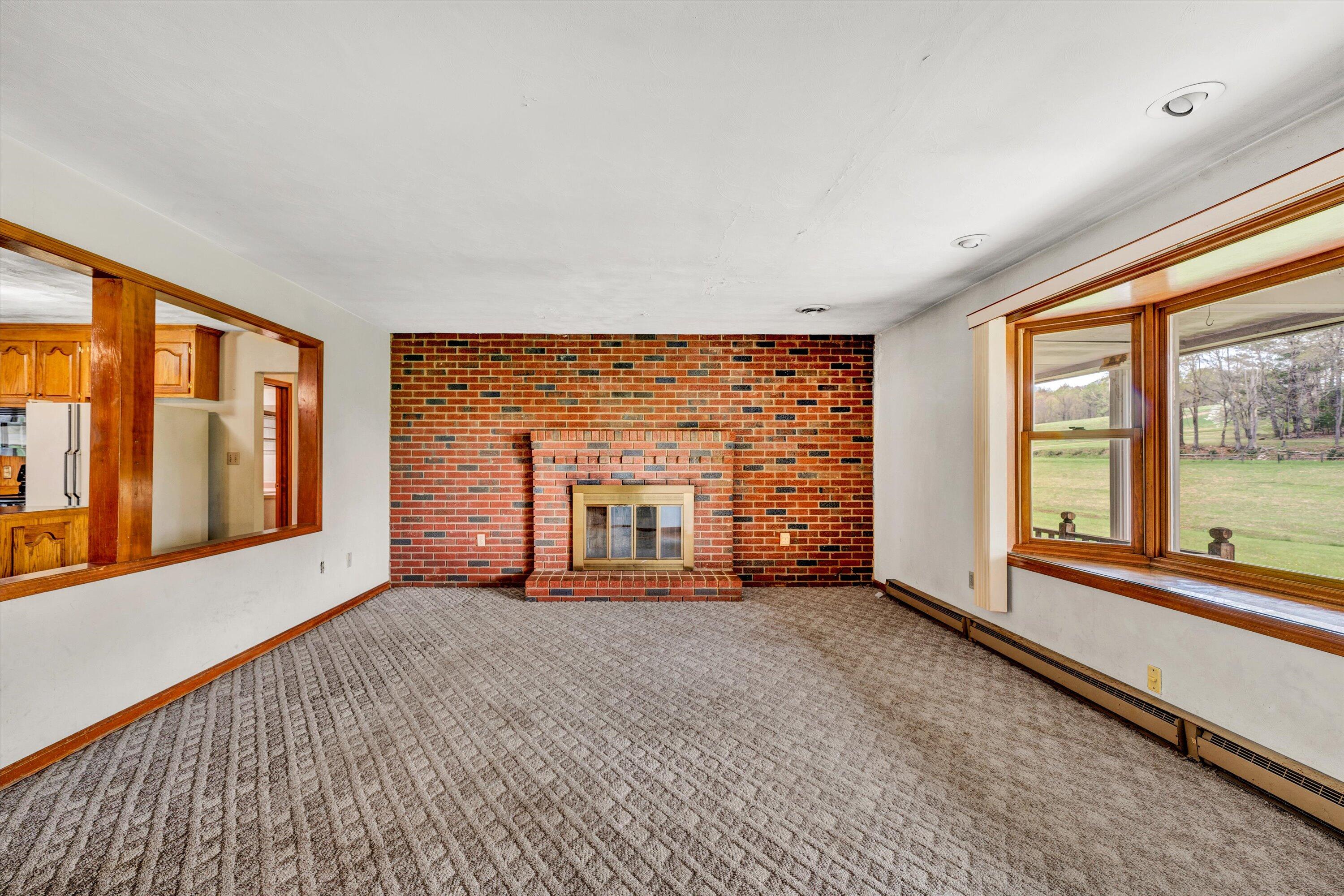 1305 Foothills Road Callaway, VA 24067 - Photo 11 of 48 wooden floor in an empty room with a window