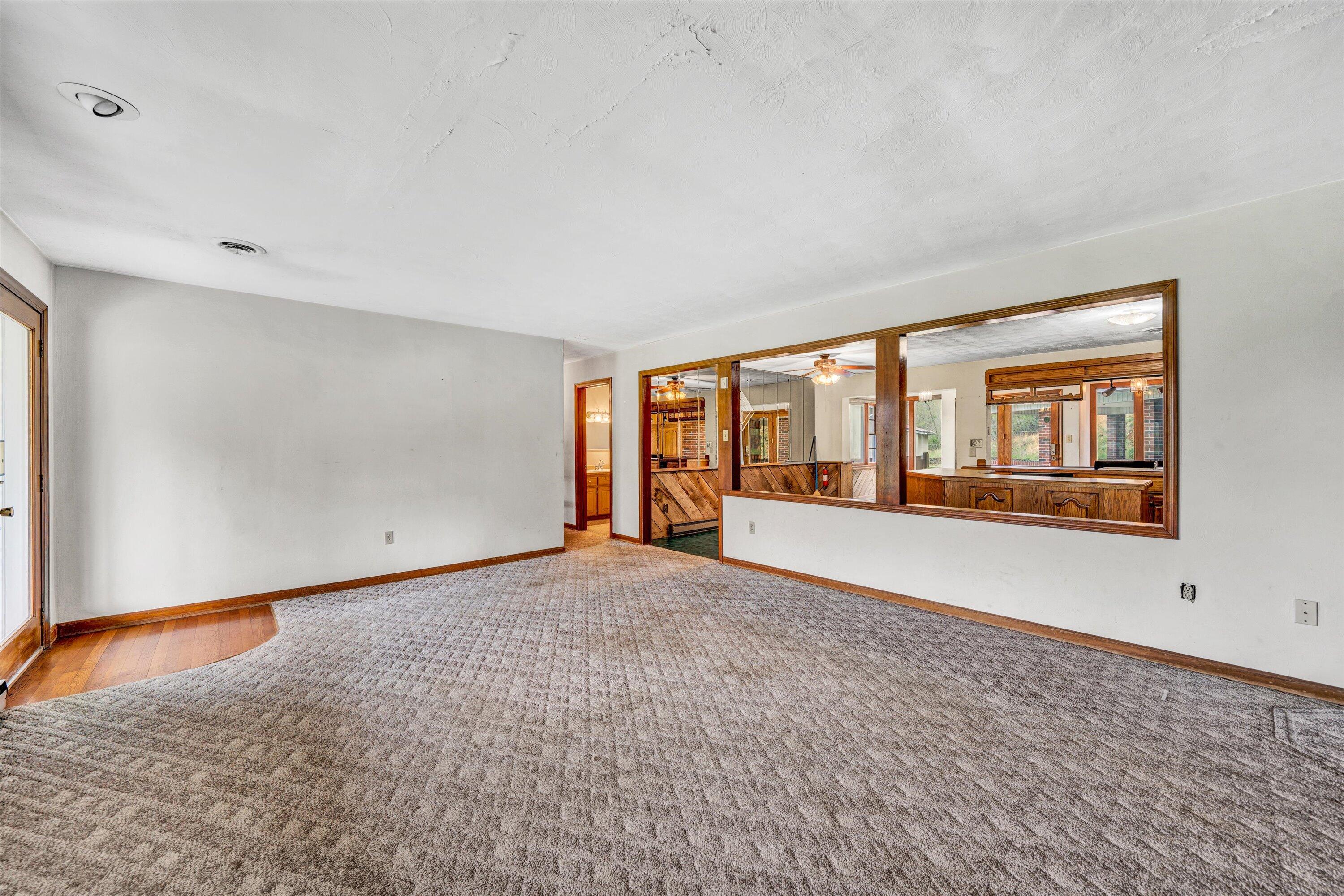 1305 Foothills Road Callaway, VA 24067 - Photo 12 of 48 a view of an empty room with a window
