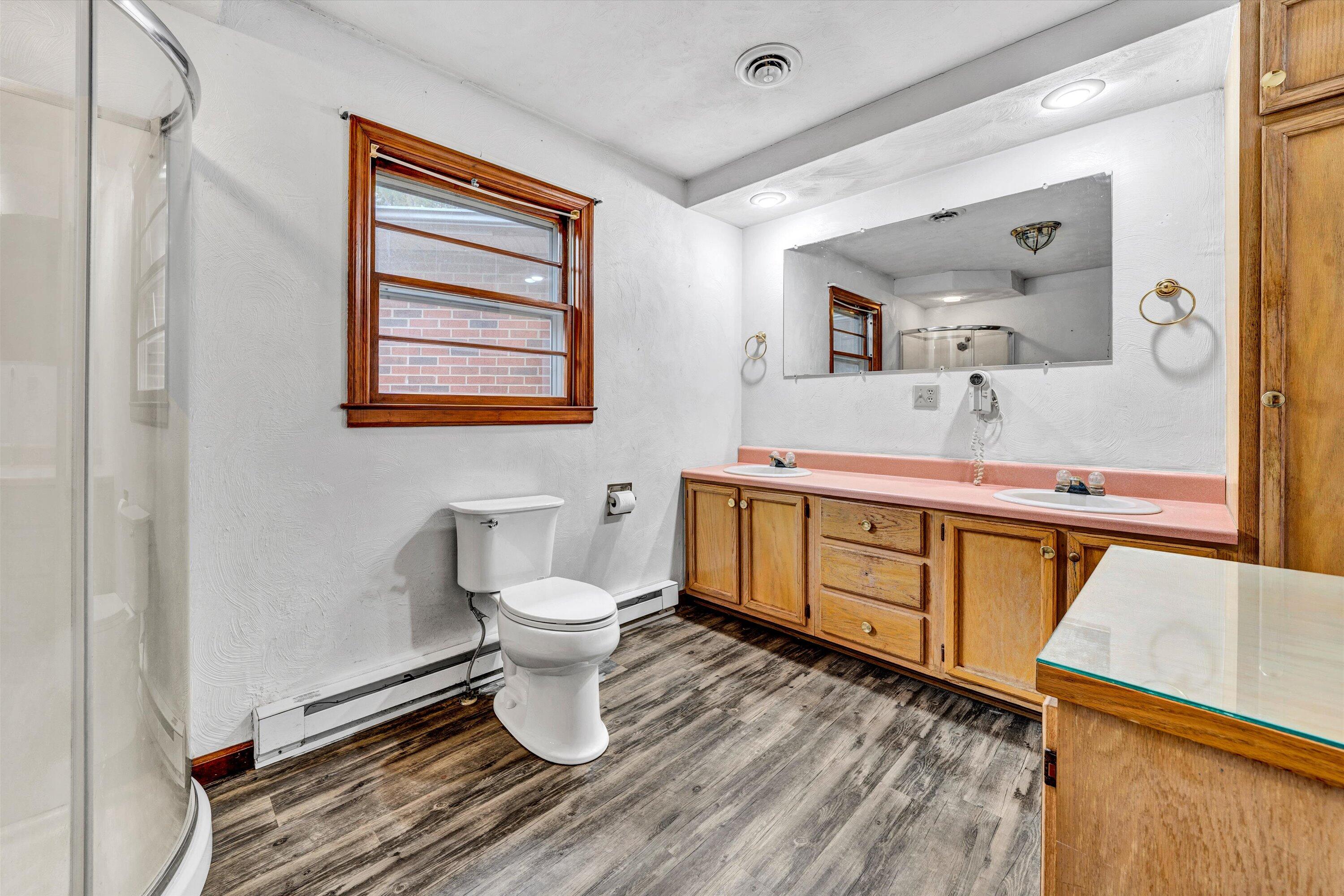 1305 Foothills Road Callaway, VA 24067 - Photo 26 of 48 a bathroom with a sink toilet and mirror