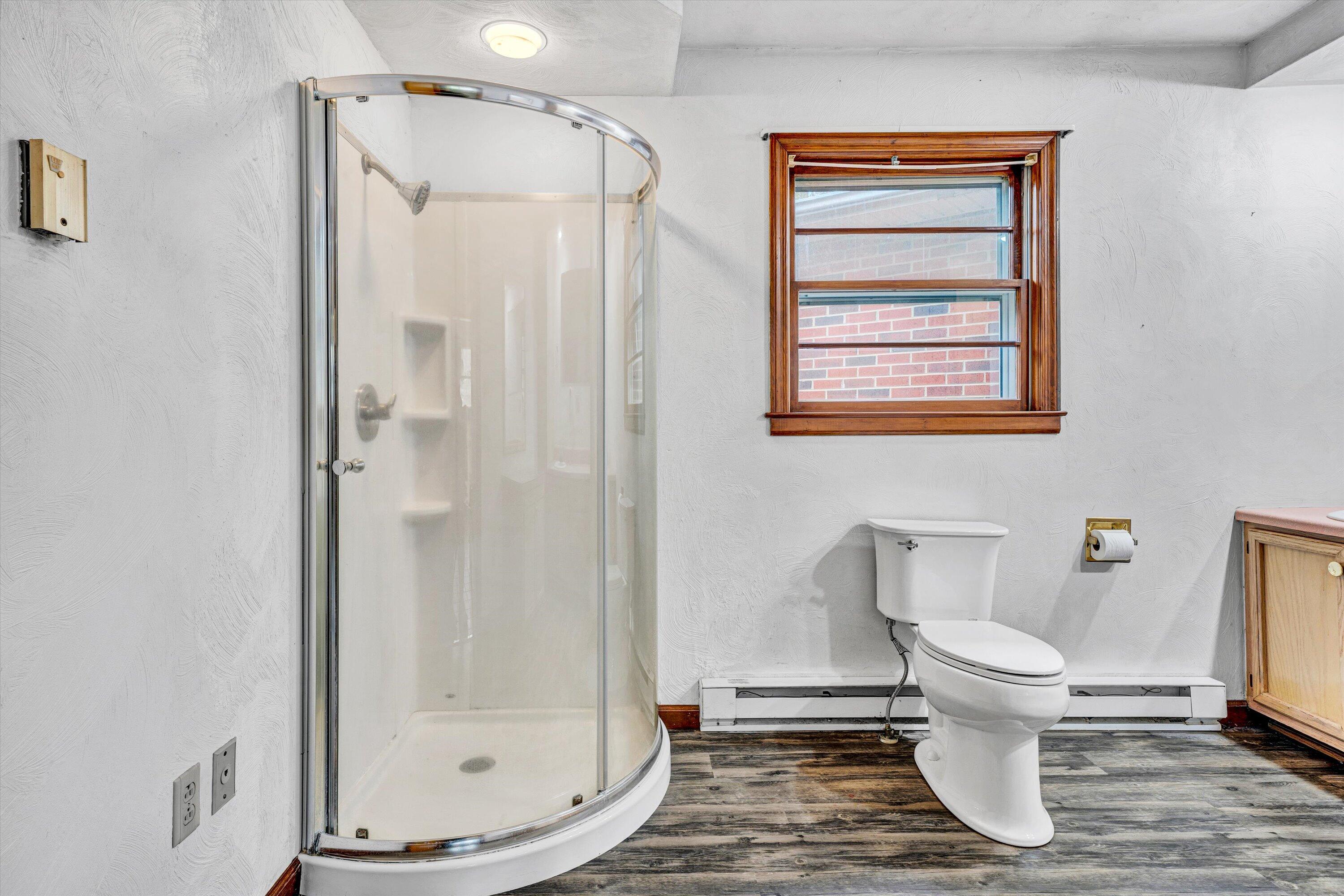 1305 Foothills Road Callaway, VA 24067 - Photo 27 of 48 a bathroom with a toilet and a shower