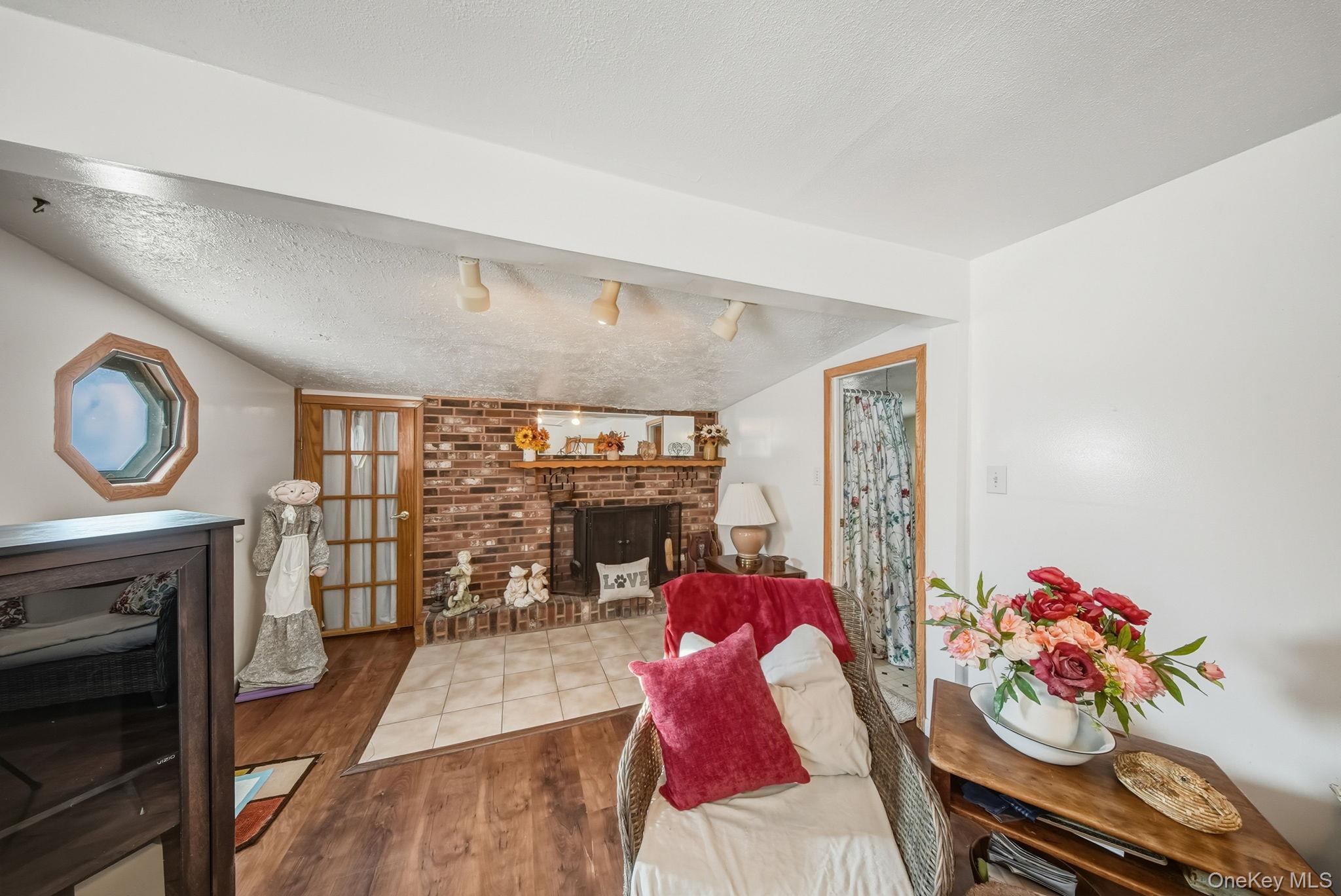 41 Birch Road Wurtsboro, NY 12790 - Photo 14 of 25 a living room with furniture and a fireplace