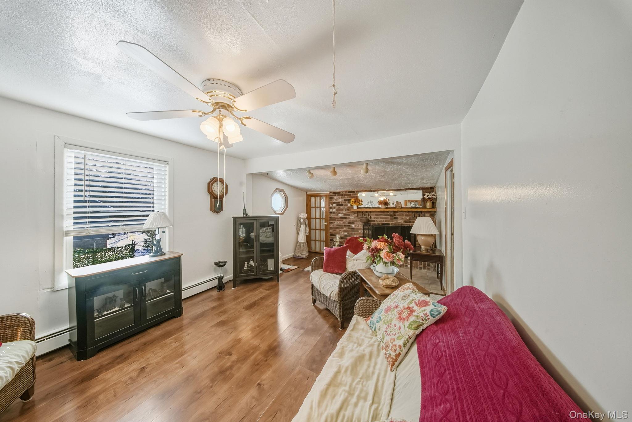 41 Birch Road Wurtsboro, NY 12790 - Photo 16 of 25 a view of a livingroom with furniture and a large window