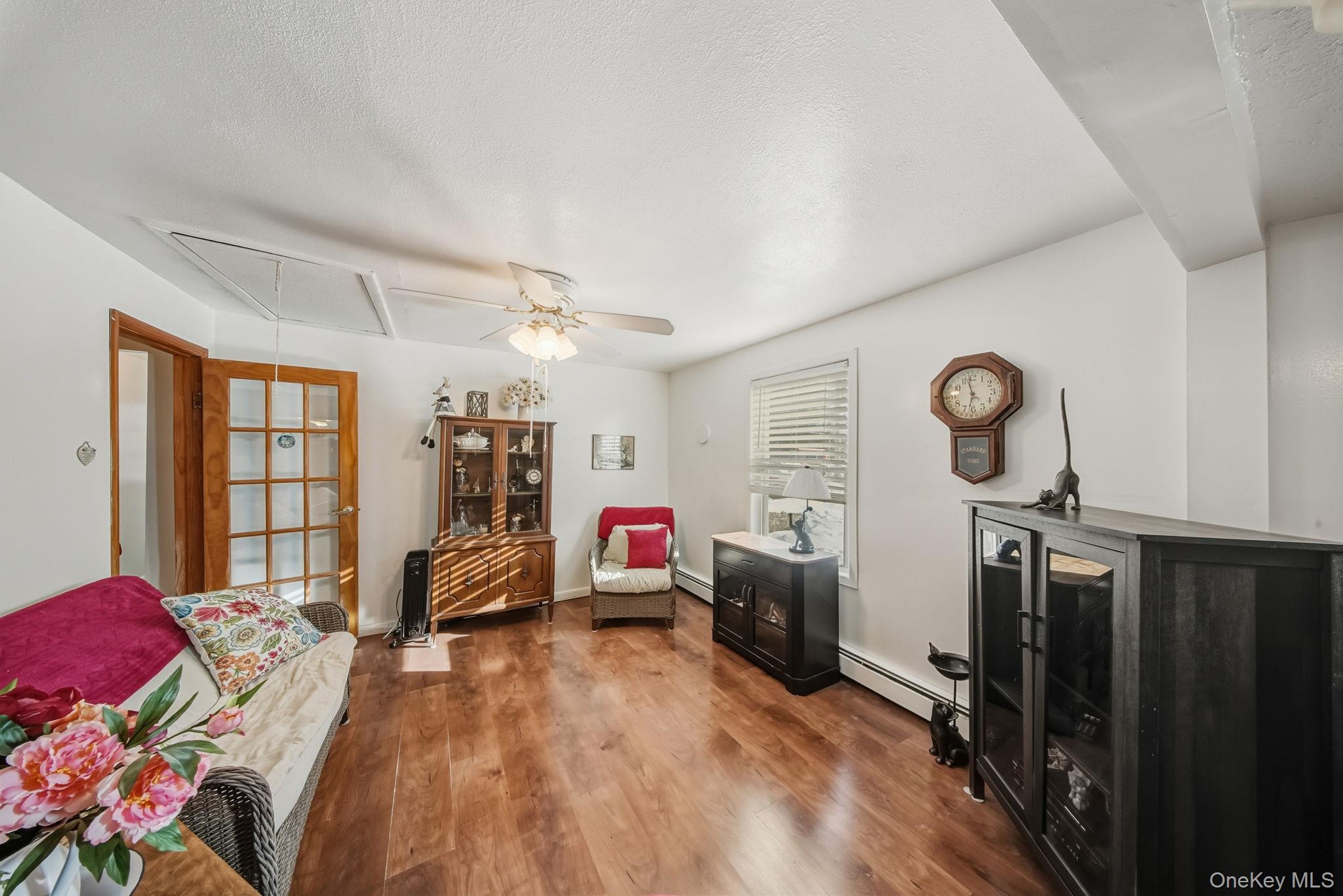 41 Birch Road Wurtsboro, NY 12790 - Photo 17 of 25 a view of a livingroom with furniture and windows