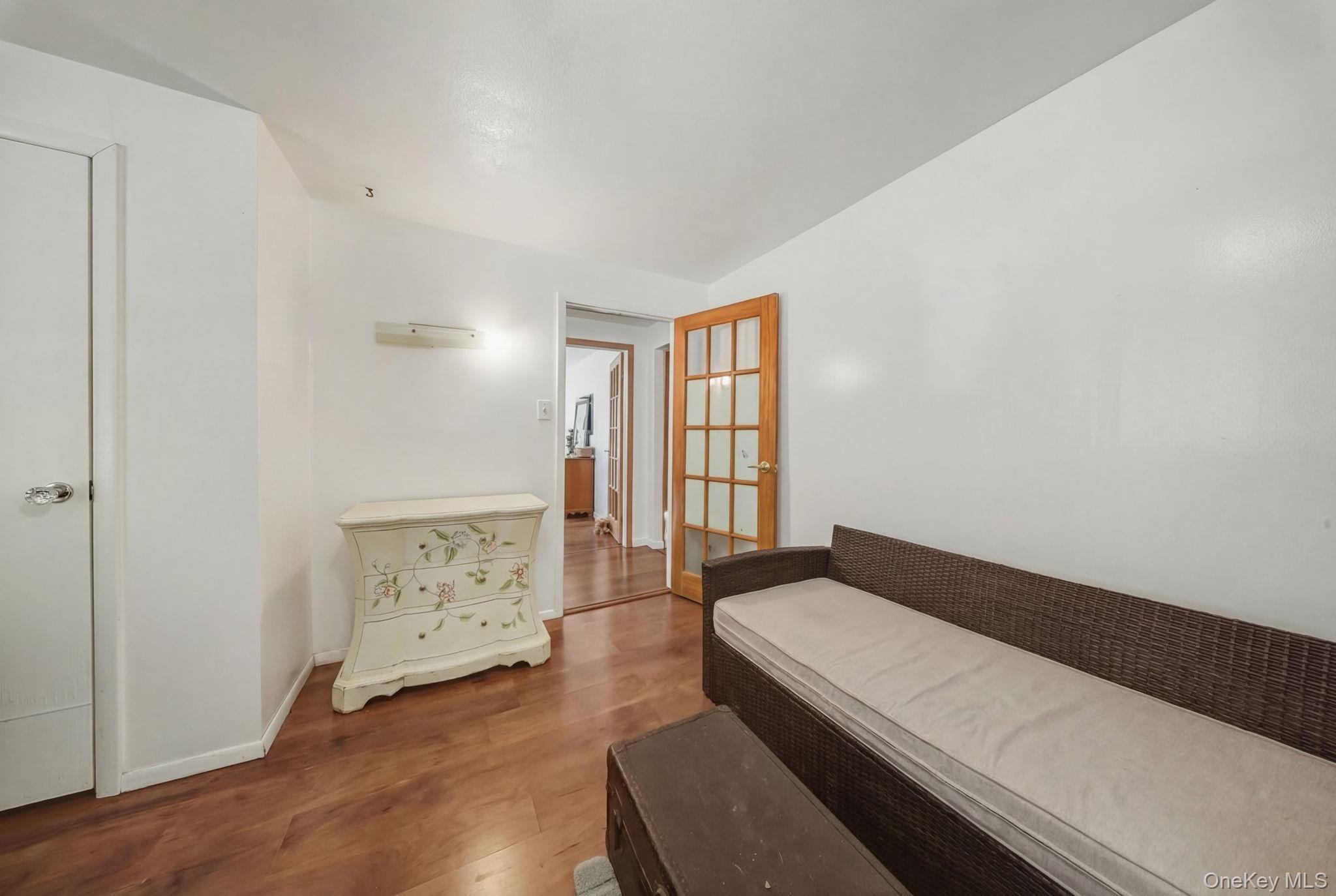 41 Birch Road Wurtsboro, NY 12790 - Photo 7 of 25 a living room with hard wood floors and a window