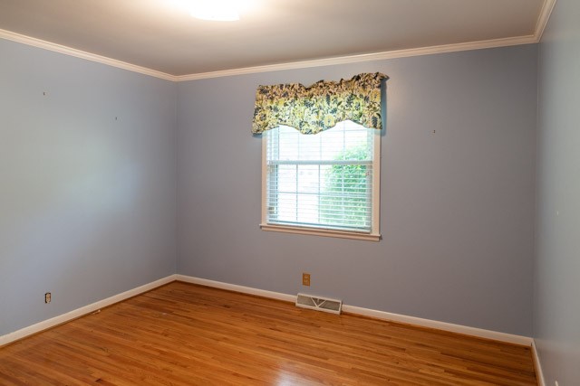 2160 Post Road Clarksville, TN 37043 - Photo 22 of 36 a view of an empty room with wooden floor and a window