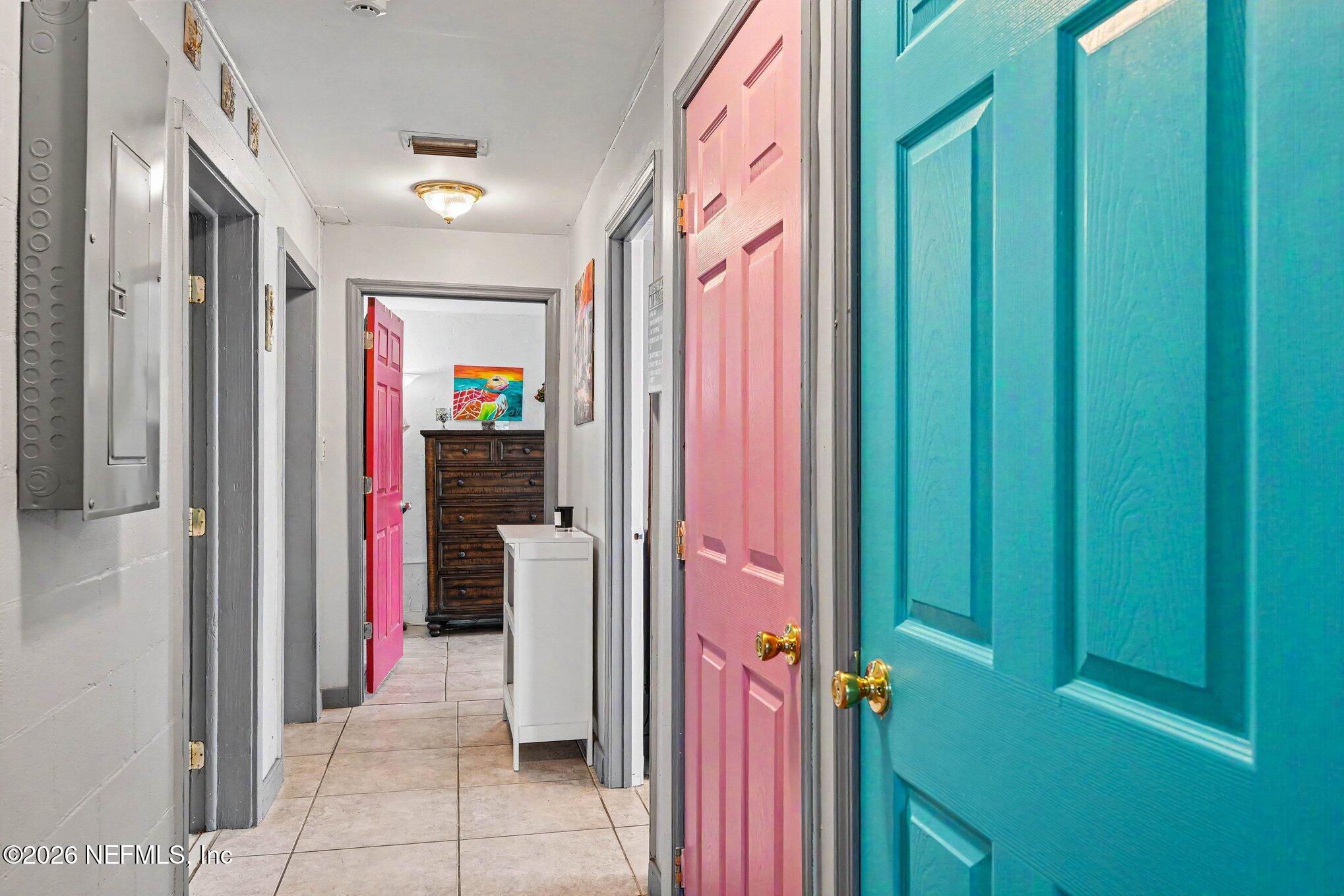 3500 Roosevelt Road Mims, FL 32754 - Photo 12 of 30 a view of a hallway with closet and furniture