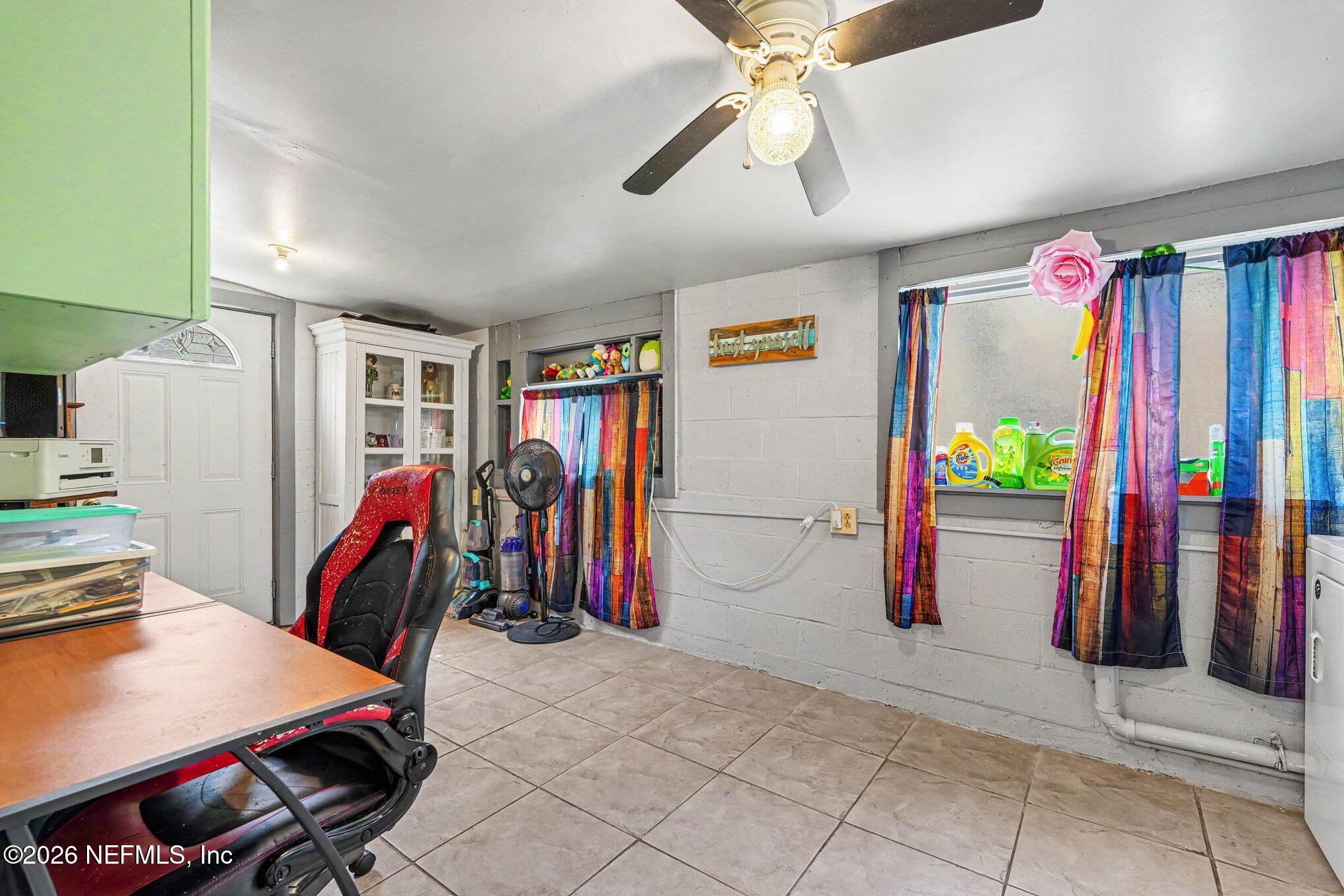 3500 Roosevelt Road Mims, FL 32754 - Photo 19 of 30 a view of a room with gym equipment