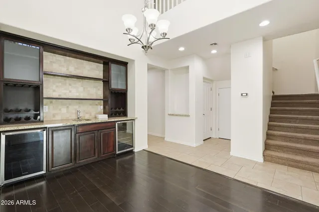 a kitchen with stainless steel appliances granite countertop a stove and a refrigerator