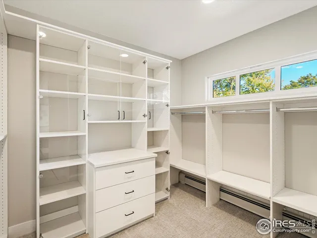 a view of an empty walk in closet