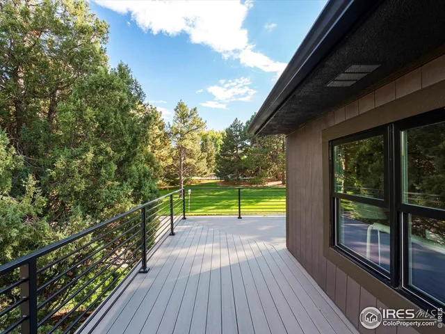 a view of swimming pool from balcony