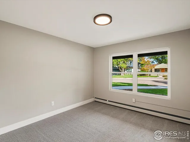 an empty room with window