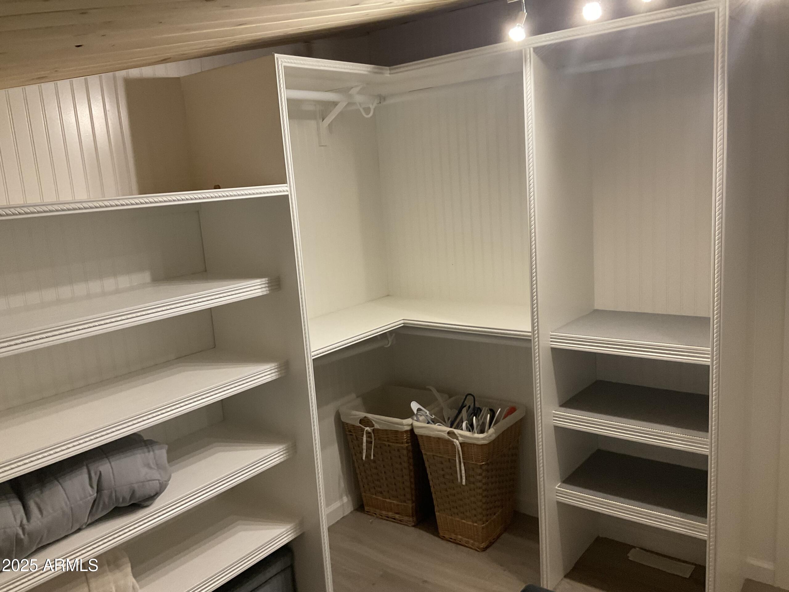 2175 West Southern Avenue, Unit 203 Apache Junction, AZ 85120 - Photo 16 of 28 a view of an empty walk in closet