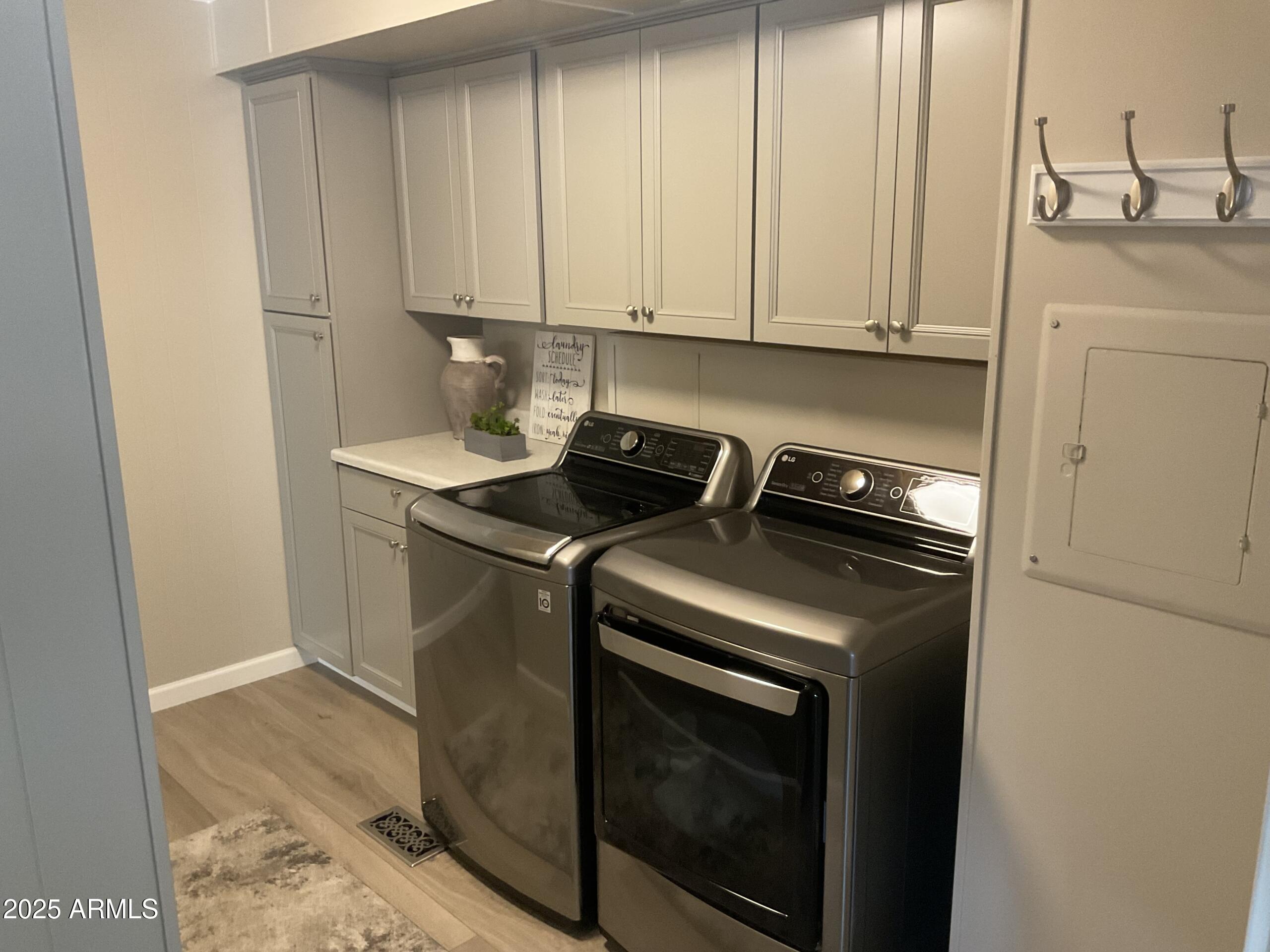 2175 West Southern Avenue, Unit 203 Apache Junction, AZ 85120 - Photo 19 of 28 a utility room with dryer and washer