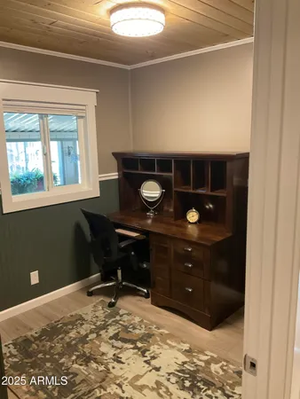 a room with a desk and chair