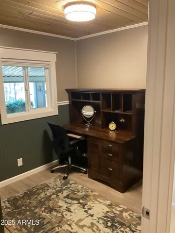 a room with a desk and chair