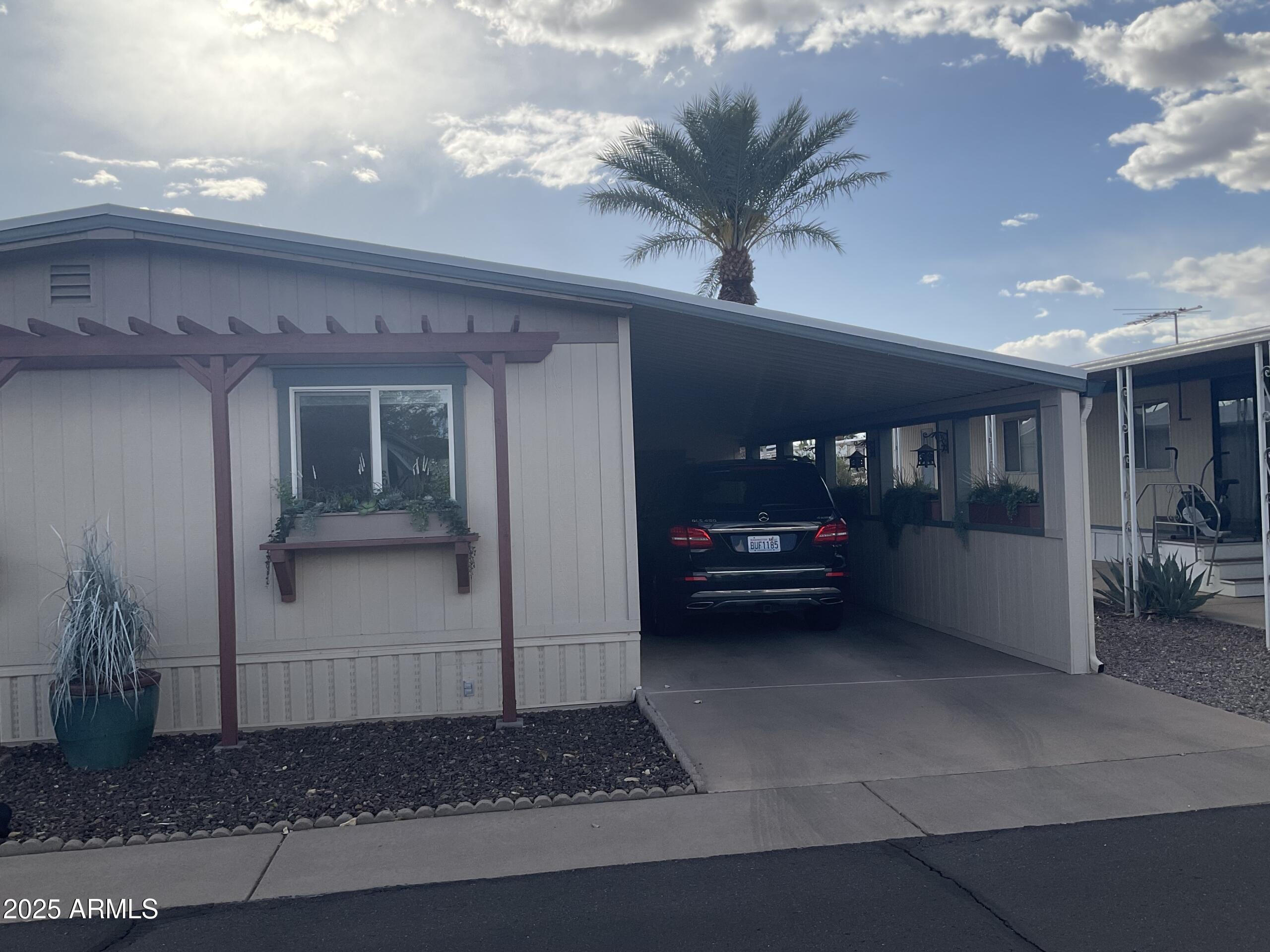 2175 West Southern Avenue, Unit 203 Apache Junction, AZ 85120 - Photo 24 of 28 a view of parking area