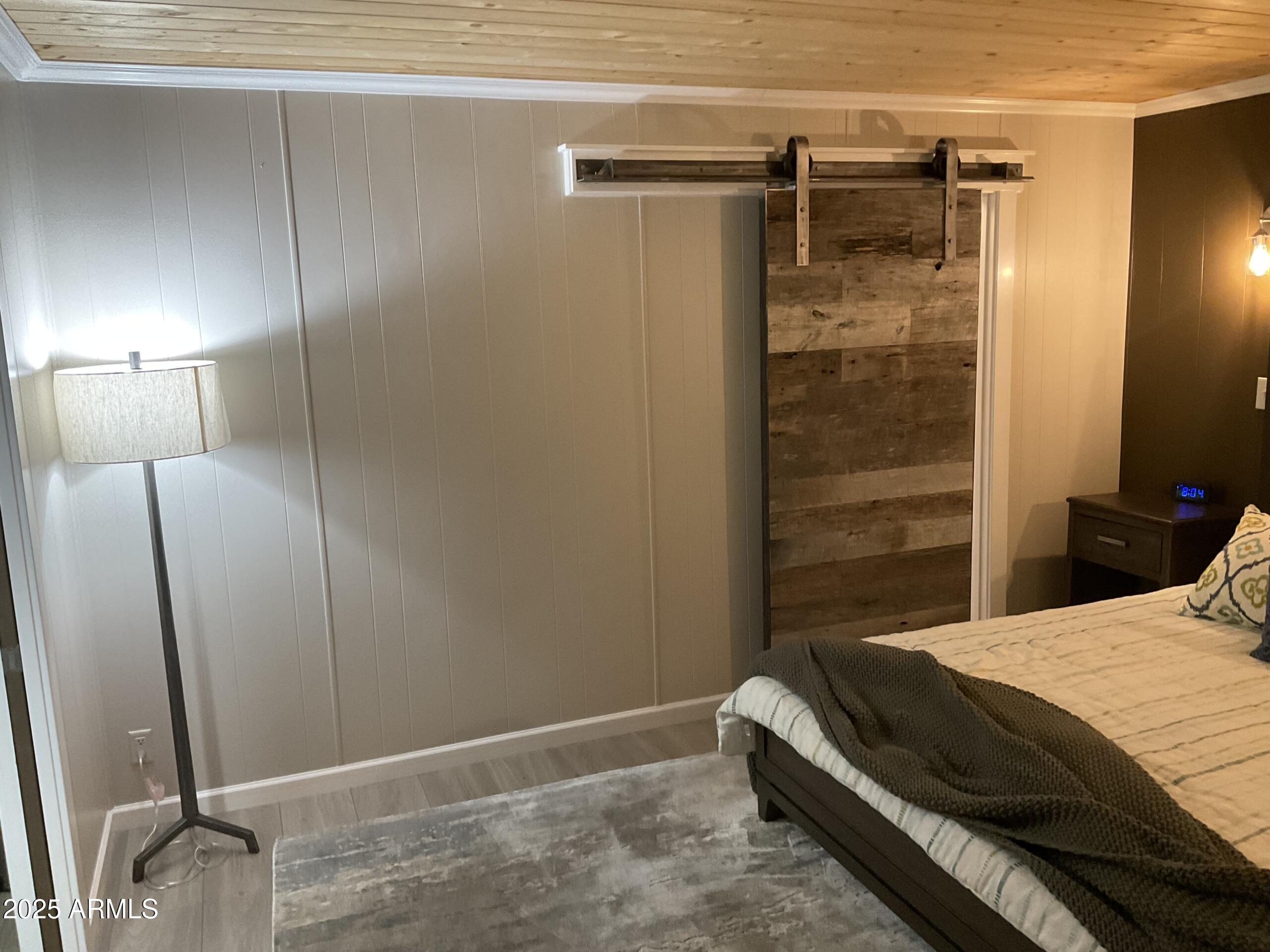 2175 West Southern Avenue, Unit 203 Apache Junction, AZ 85120 - Photo 28 of 28 a bedroom with a bed and a shower