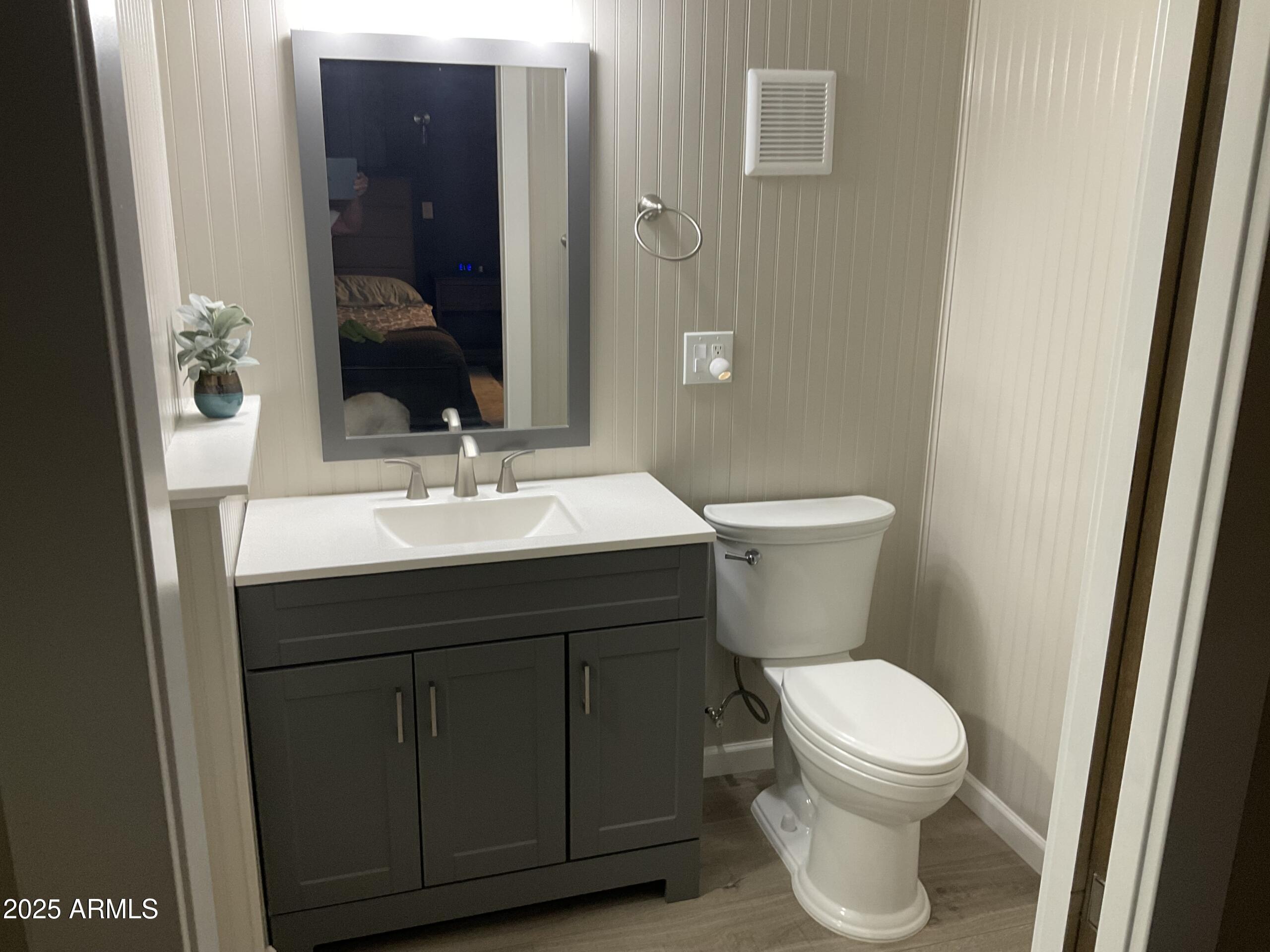 2175 West Southern Avenue, Unit 203 Apache Junction, AZ 85120 - Photo 5 of 28 a bathroom with a sink and a toilet