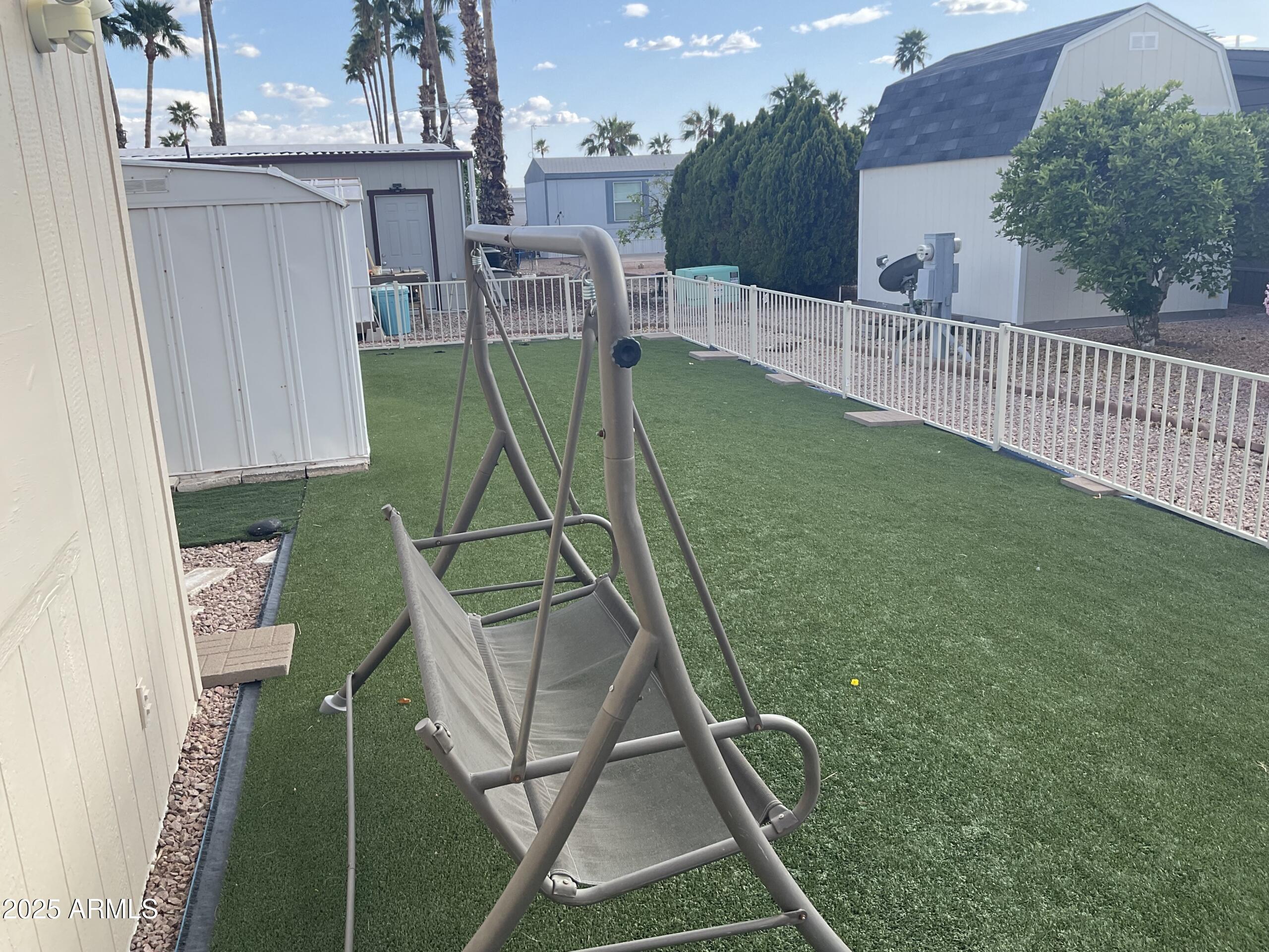 2175 West Southern Avenue, Unit 203 Apache Junction, AZ 85120 - Photo 7 of 28 a view of a backyard