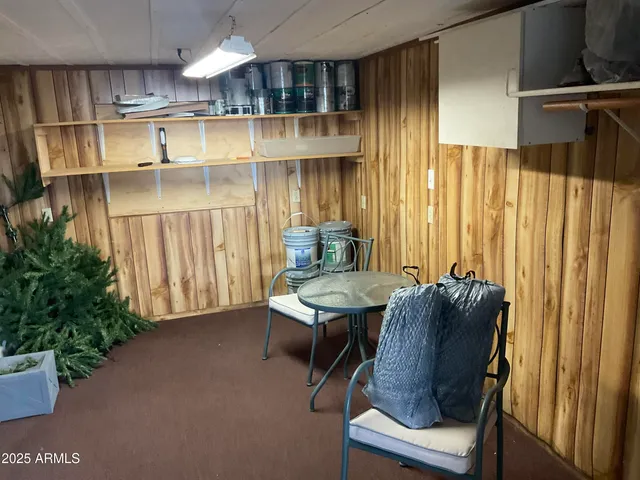 a workspace with furniture and window