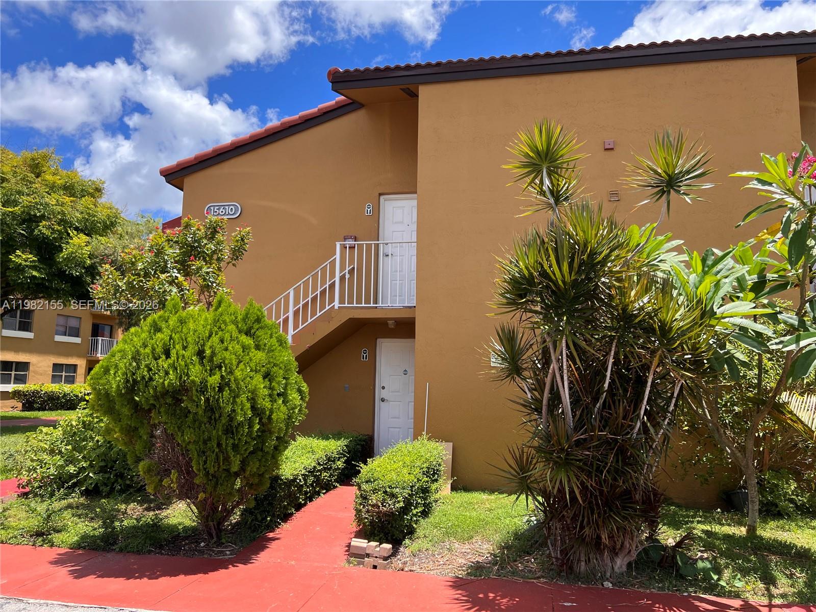 15610 Southwest 80th Street, Unit J105 Miami, FL 33193 - Photo 21 of 38 a view of a sky from a balcony