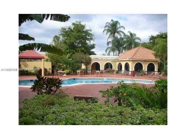 15610 Southwest 80th Street, Unit J105 Miami, FL 33193 - Photo 29 of 38 a view of an outdoor space