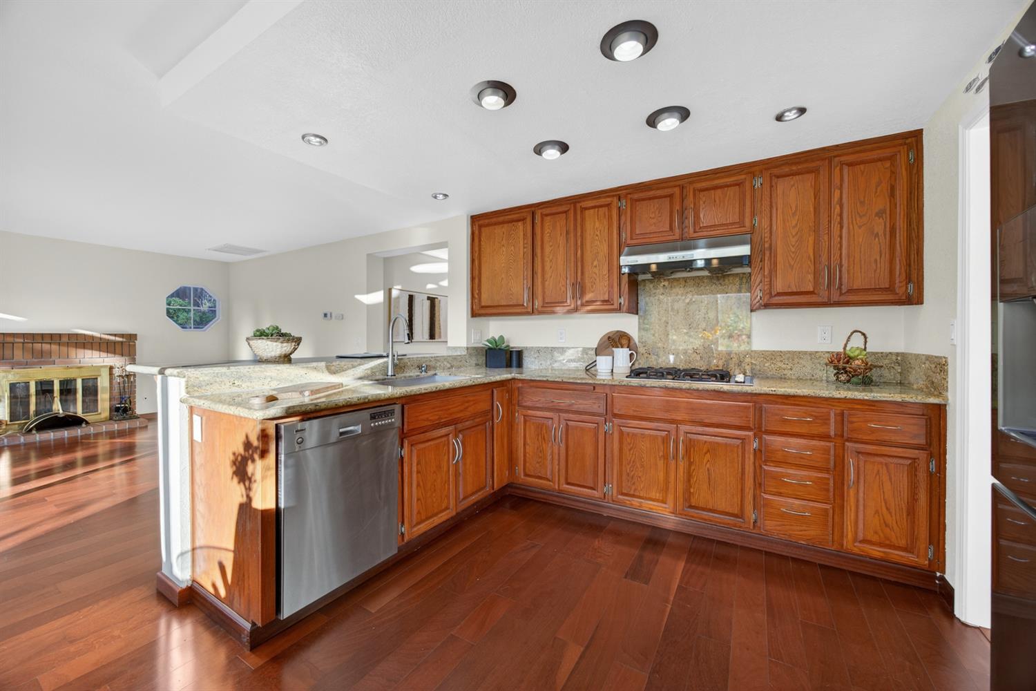248 Carson Street Hercules, CA 94547 - Photo 16 of 70 a kitchen with stainless steel appliances granite countertop a sink stove and cabinets