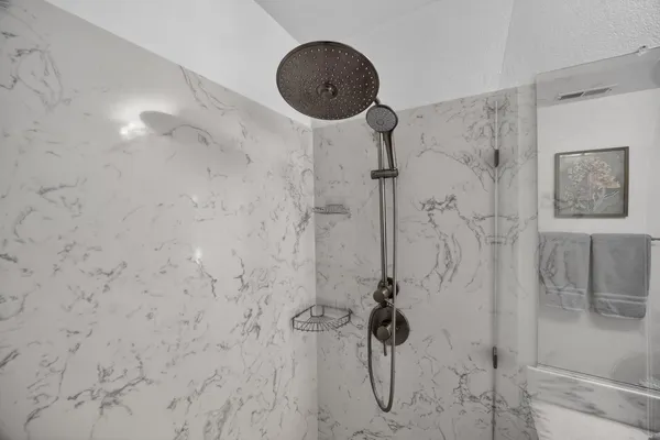 a bathroom with sink and mirror