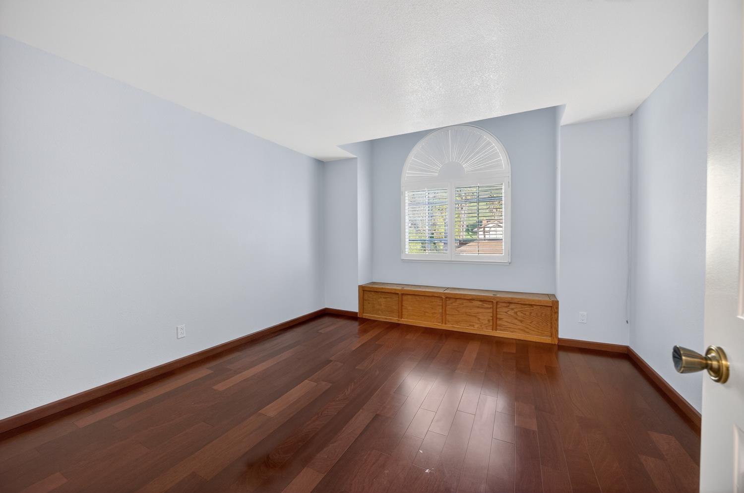 248 Carson Street Hercules, CA 94547 - Photo 44 of 70 an empty room with wooden floor and windows