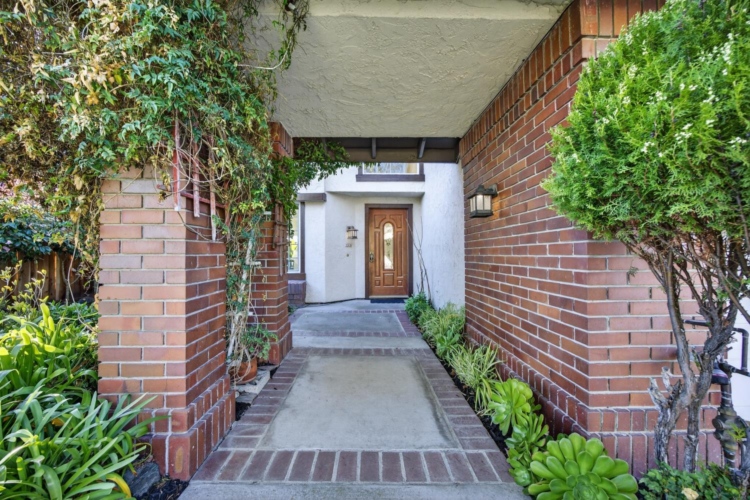 248 Carson Street Hercules, CA 94547 - Photo 6 of 70 a front view of a house with a garden