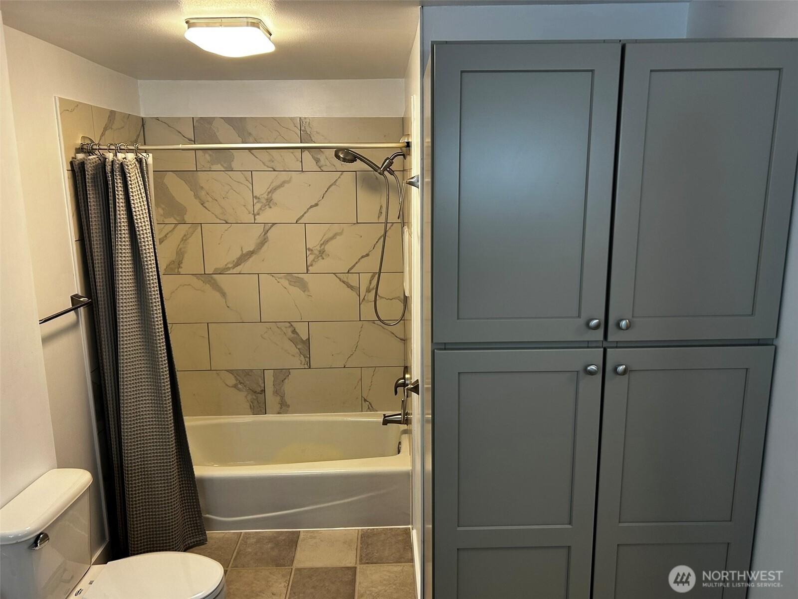 4131 Delphi Road Southwest Olympia, WA 98512 - Photo 13 of 39 a bathroom with a shower and a toilet