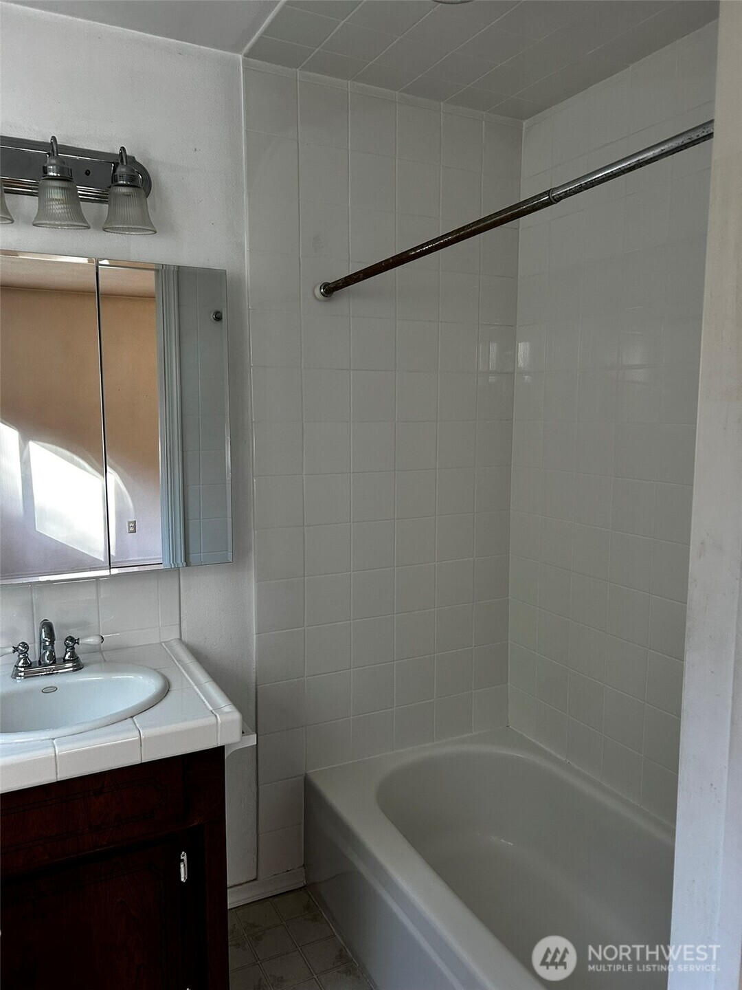 4131 Delphi Road Southwest Olympia, WA 98512 - Photo 17 of 39 a bathroom with a granite countertop sink and a bathtub