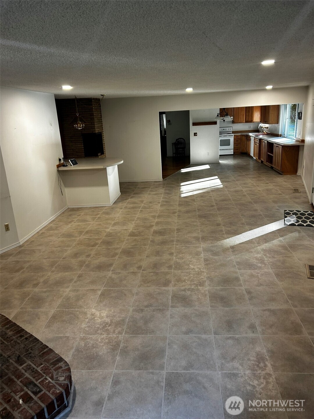 4131 Delphi Road Southwest Olympia, WA 98512 - Photo 25 of 39 a view of a livingroom with kitchen