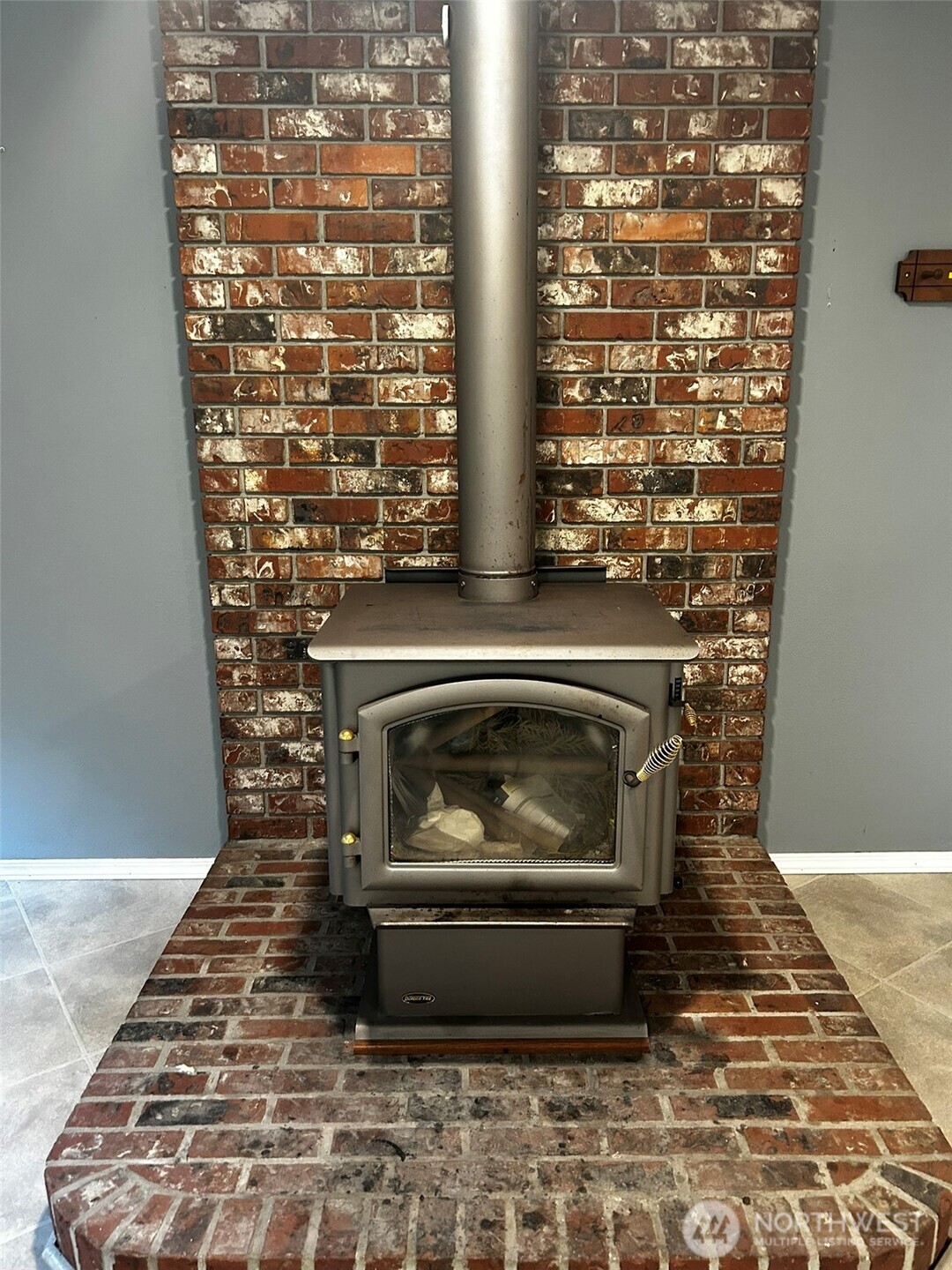 4131 Delphi Road Southwest Olympia, WA 98512 - Photo 26 of 39 a living room with a fireplace