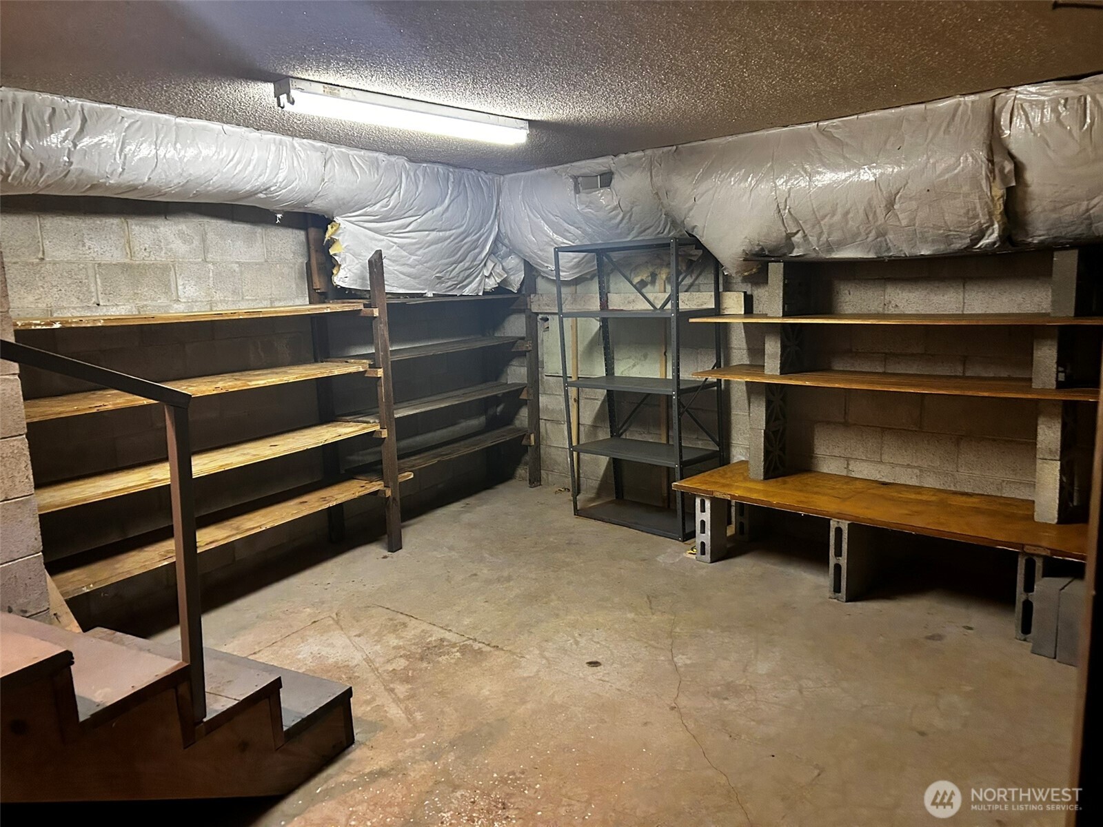 4131 Delphi Road Southwest Olympia, WA 98512 - Photo 31 of 39 a storage room with racks