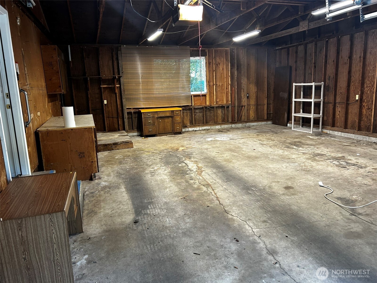 4131 Delphi Road Southwest Olympia, WA 98512 - Photo 32 of 39 a view of a livingroom with furniture and a kitchen