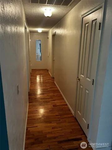 a bathroom with a shower and a toilet