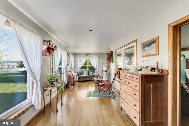 a room with furniture and a book shelf