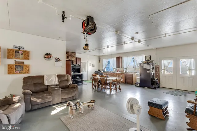 a view of a swimming pool with a yard and mountain view