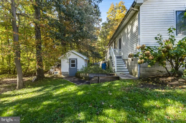 a view of a house with swimming pool