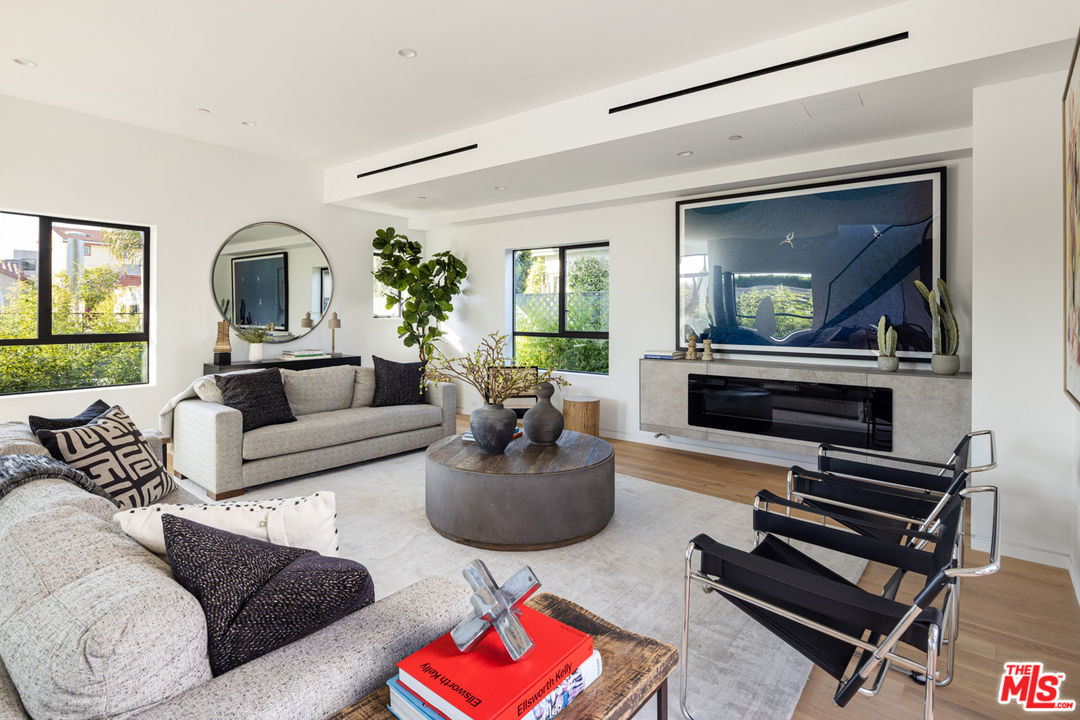 700 Brooks Avenue Venice, CA 90291 - Photo 11 of 53 a living room with furniture and a fireplace