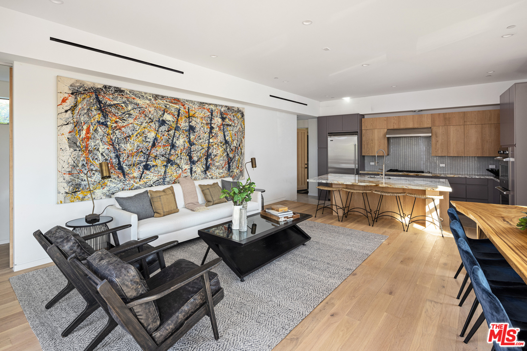 700 Brooks Avenue Venice, CA 90291 - Photo 17 of 53 a living room with furniture and a large window
