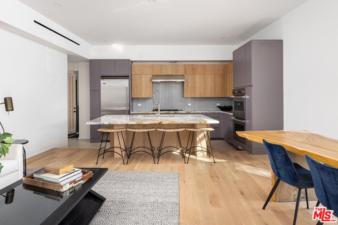 700 Brooks Avenue Venice, CA 90291 - Photo 19 of 53 a view of a dining room with furniture and a table