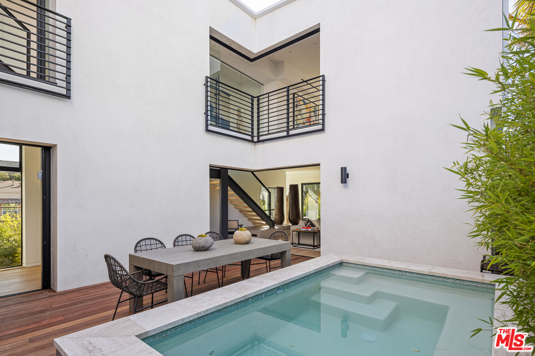 700 Brooks Avenue Venice, CA 90291 - Photo 3 of 53 a view of a house with porch and wooden floor