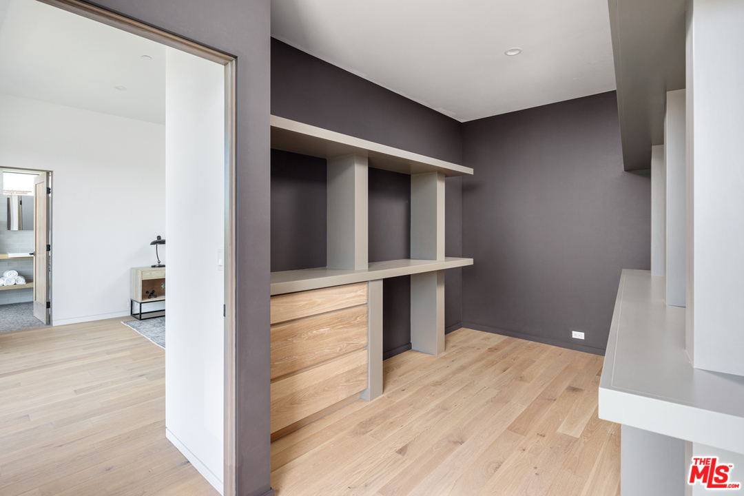 700 Brooks Avenue Venice, CA 90291 - Photo 33 of 53 a view of a hallway with wooden floor and closet