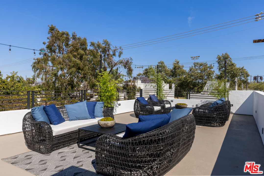 700 Brooks Avenue Venice, CA 90291 - Photo 45 of 53 a view of outdoor sitting area with furniture and wooden floor