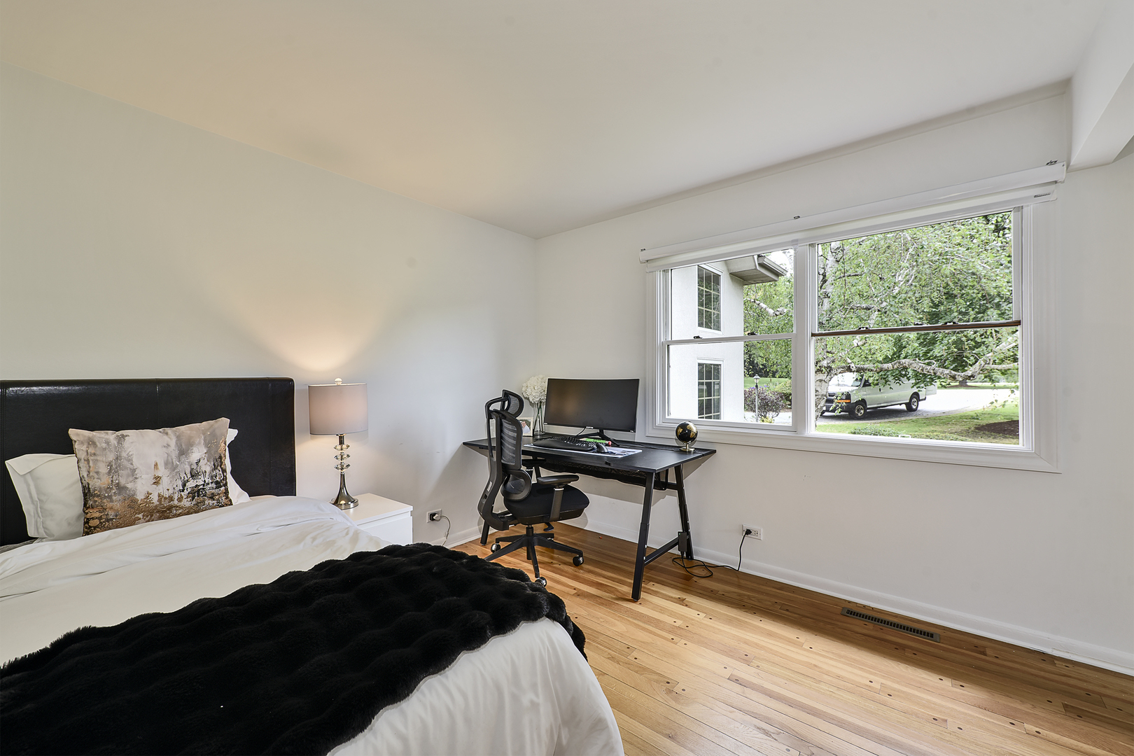 144 North Highland Road Inverness, IL 60067 - Photo 25 of 49 a bedroom with a bed and a window