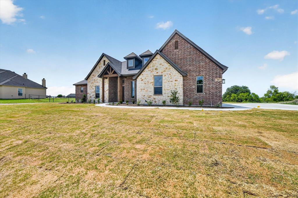 517 Longhorn Lane Springtown, TX 76082 - Photo 3 of 39 View of front of property featuring brick siding and stone siding