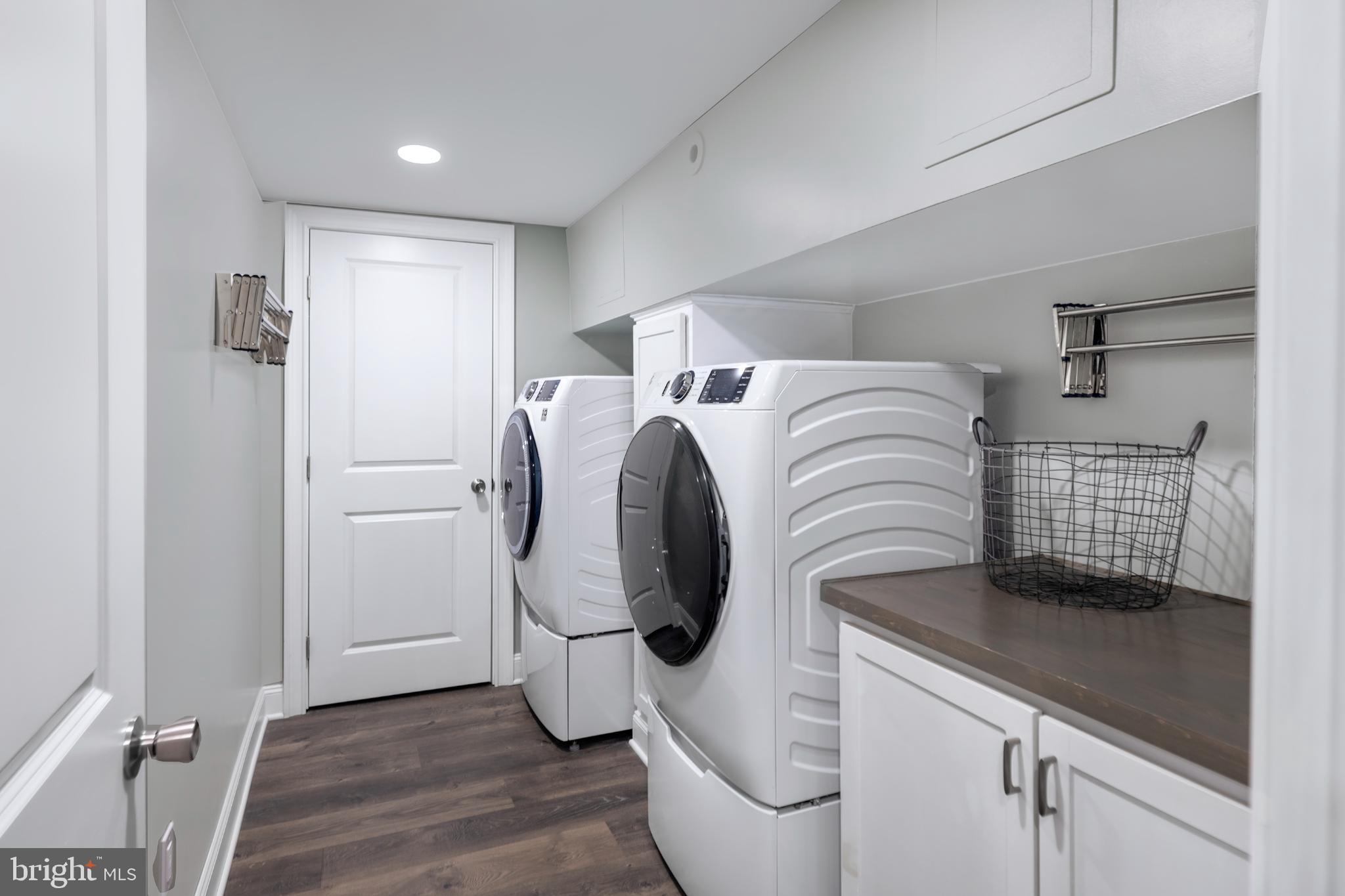 16 Effingham Road Yardley, PA 19067 - Photo 26 of 33 Modern laundry room with sleek appliances.