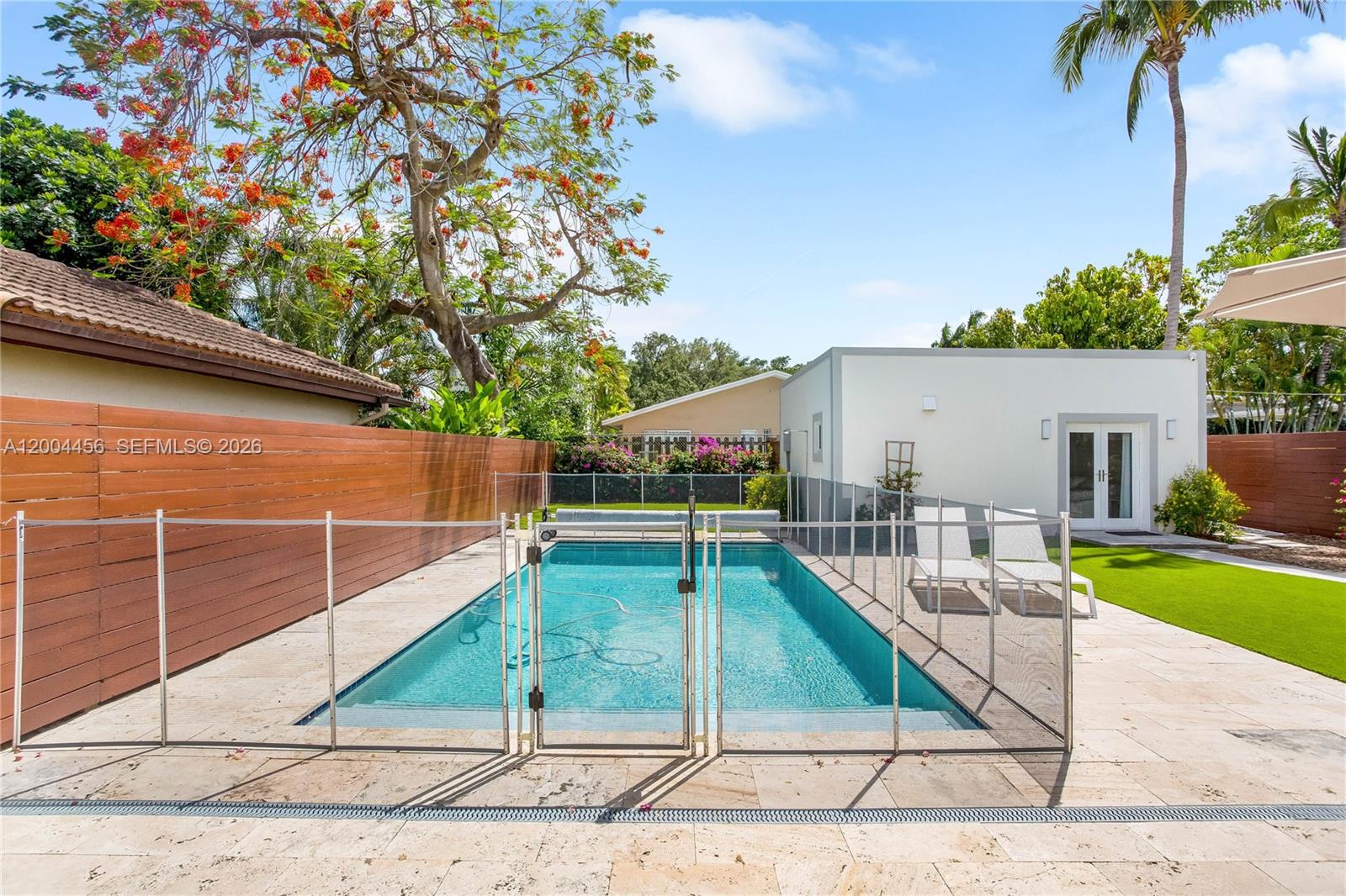 152 Southwest 20th Road Miami, FL 33129 - Photo 21 of 22 a view of a backyard with swimming pool